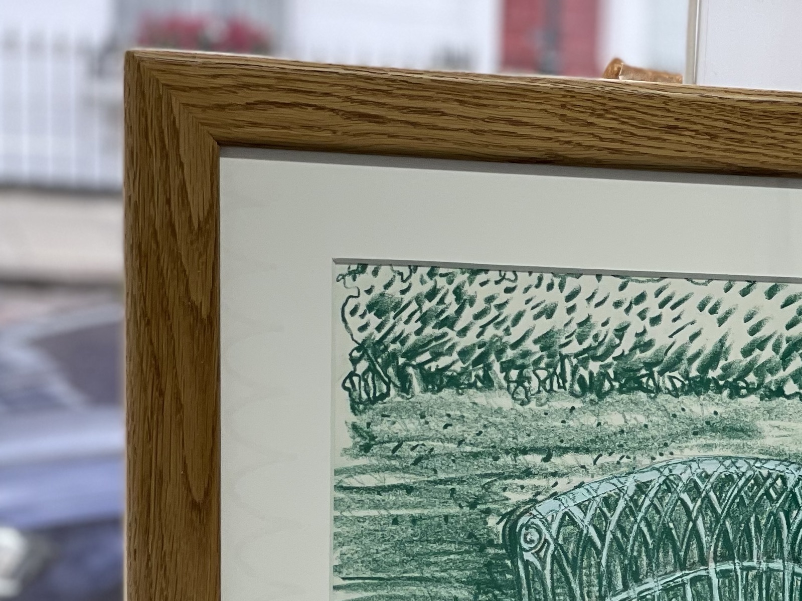 Hand-finished natural oak frame with light wax